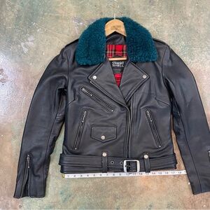“Straight to Hell” Black leather jacket with dark teal collar. Style and Warmth.